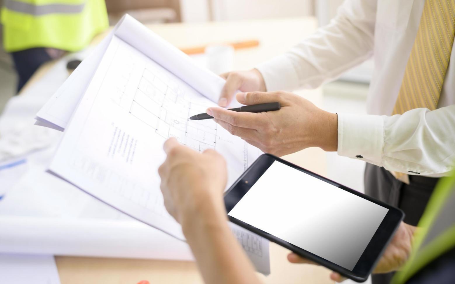 Financial research workspace with analysis documents and market data